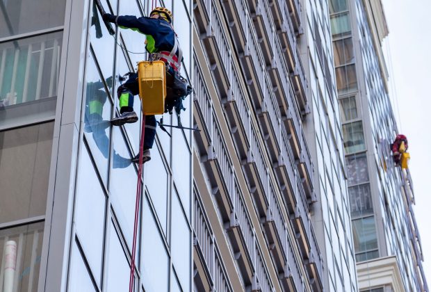 window washers cleaning the exterior of a building 2026 01 08 23 06 08 utc